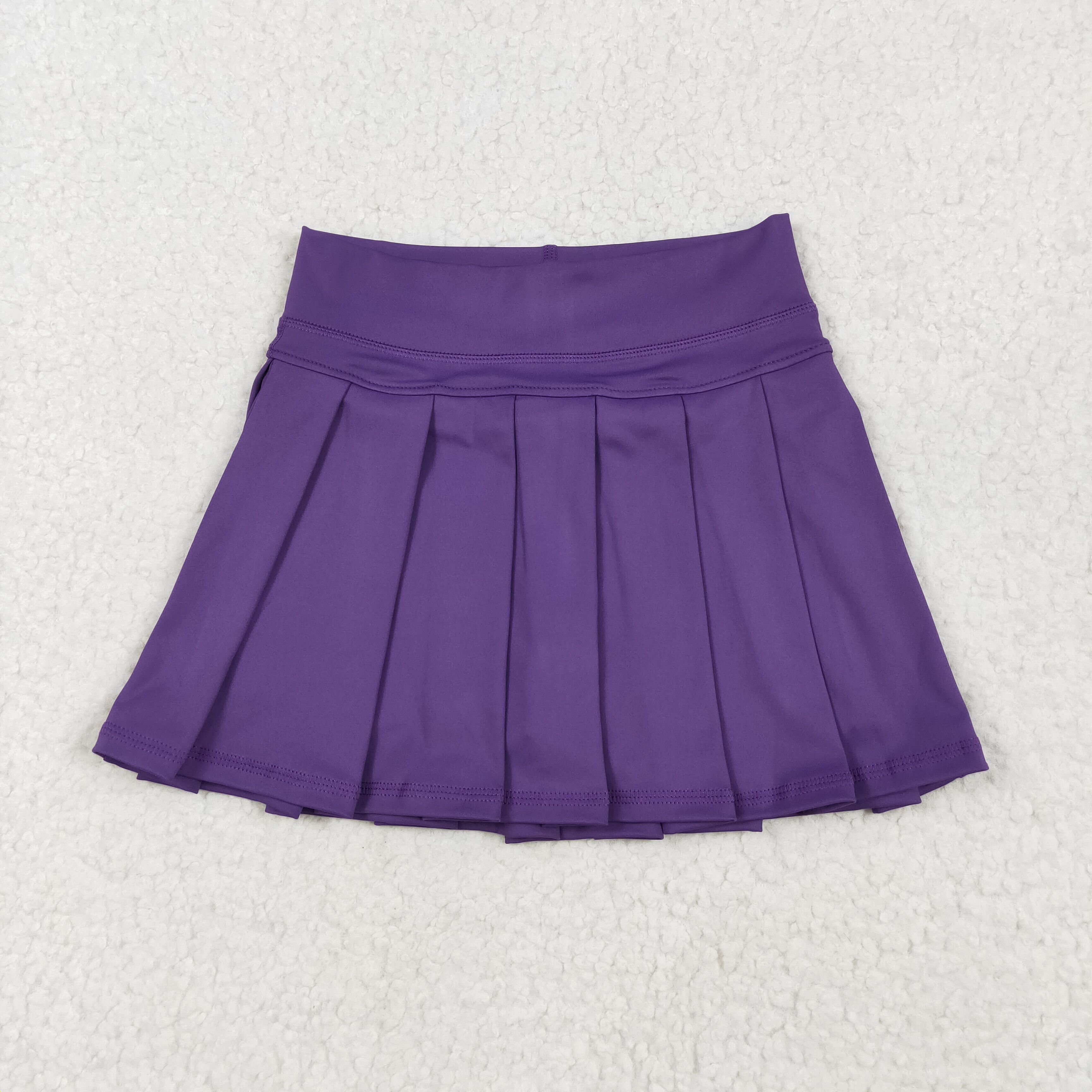 Falda plisada morada para bebé - Baby Yoga Clothing reseña y precio