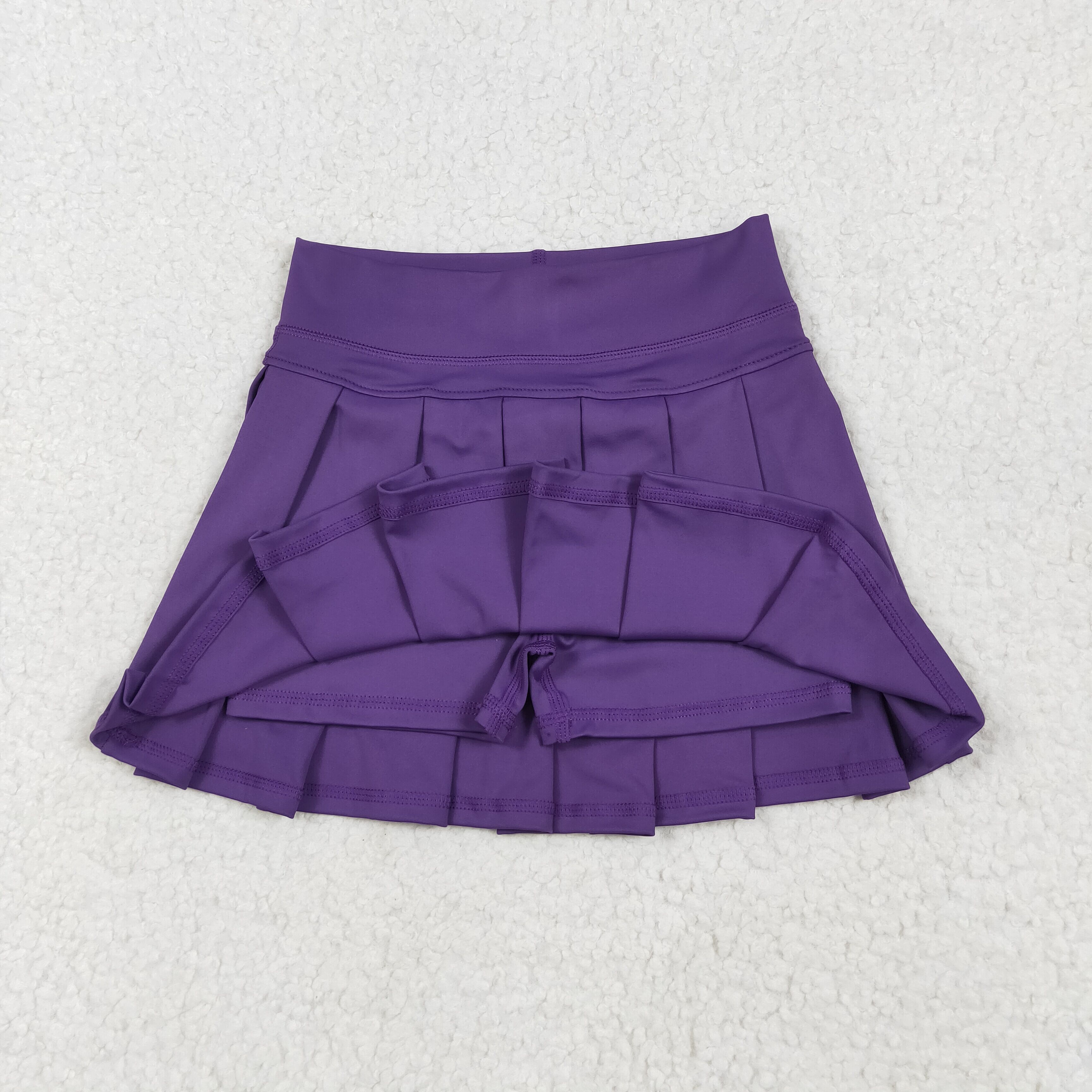 Falda plisada morada para bebé - Baby Yoga Clothing reseña y precio